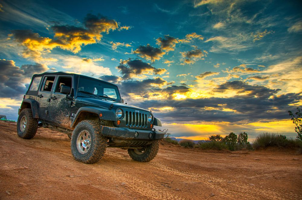 Jeep car in sunset