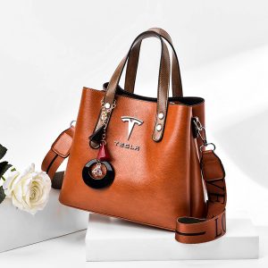 TESLA, tesla bags, tesla frunk bag, TESLA handbags, TESLA leather handbags, tesla leather purse, tesla leather purses, tesla on bags, TESLA purses, TESLA women handbags, TESLA women leather handbags, TESLA women purses